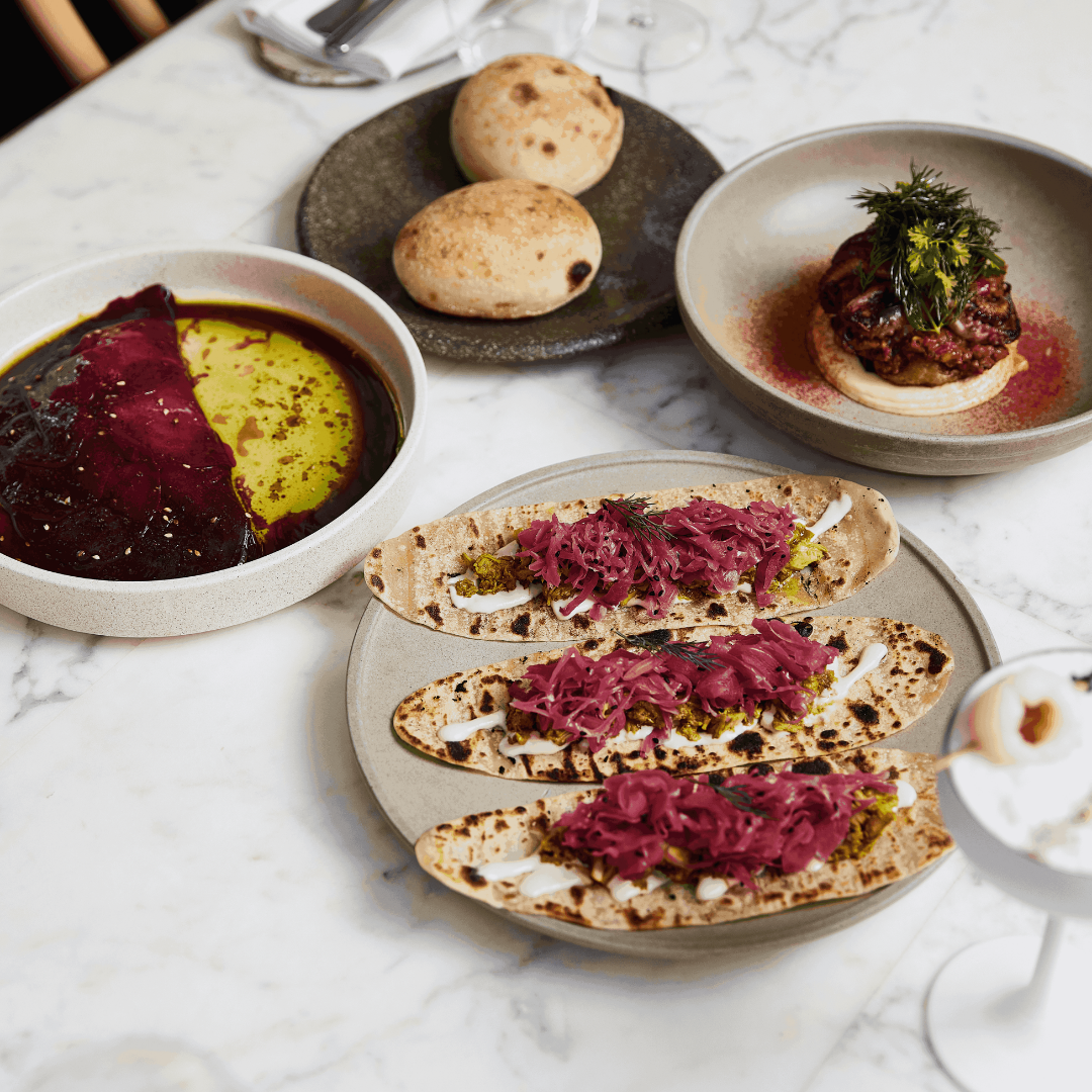 A selection of colourful dishes at NOUR Restaurant Sydney