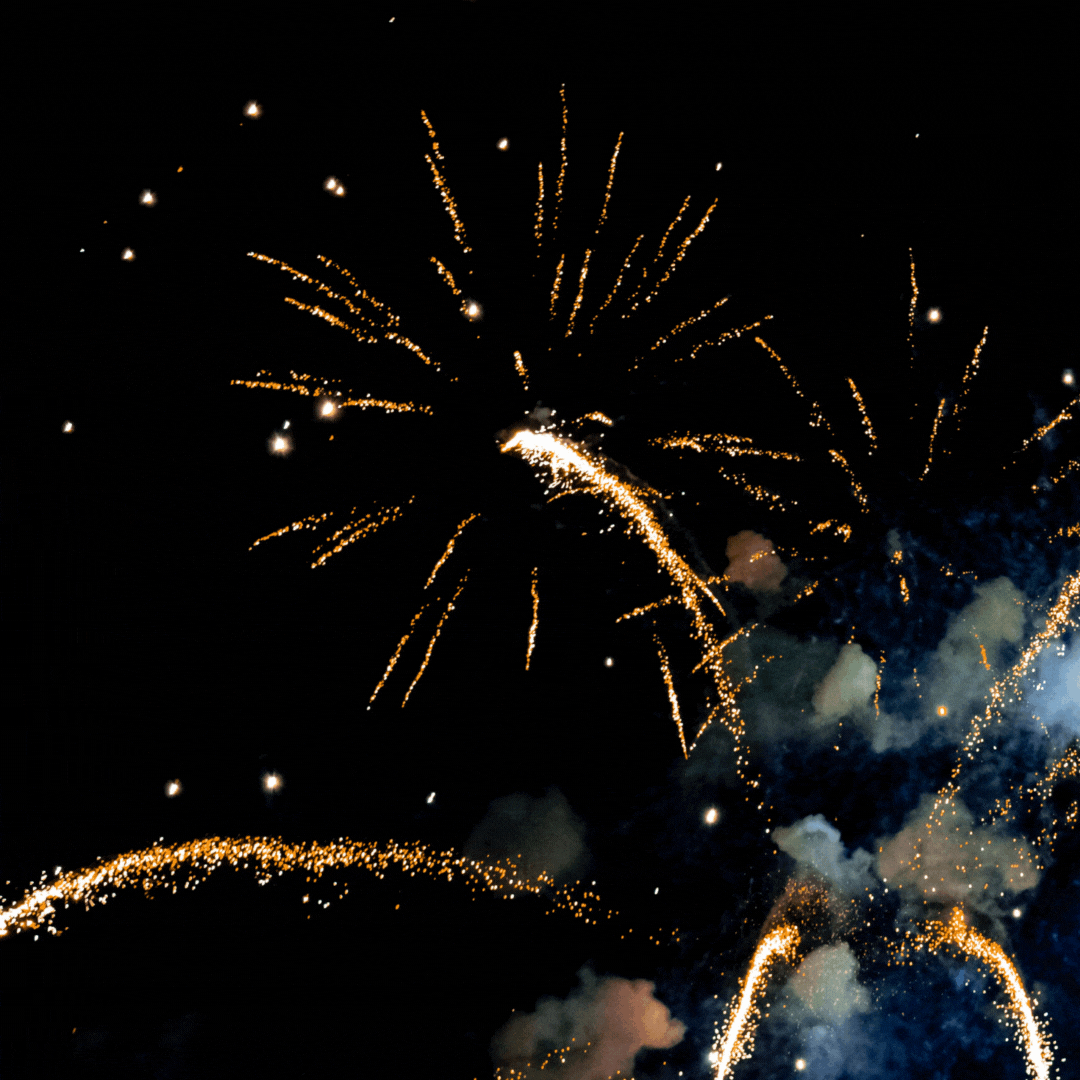 A GIF showcasing vibrant fireworks lighting up a night sky for NOUR Restaurant Sydney New Year's Eve 2024  specials